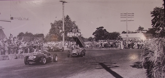 Len(Cooper-Climax), Stan and Arnold Glass(both Maserati 250F's) , pub corner, 1959 AGP.