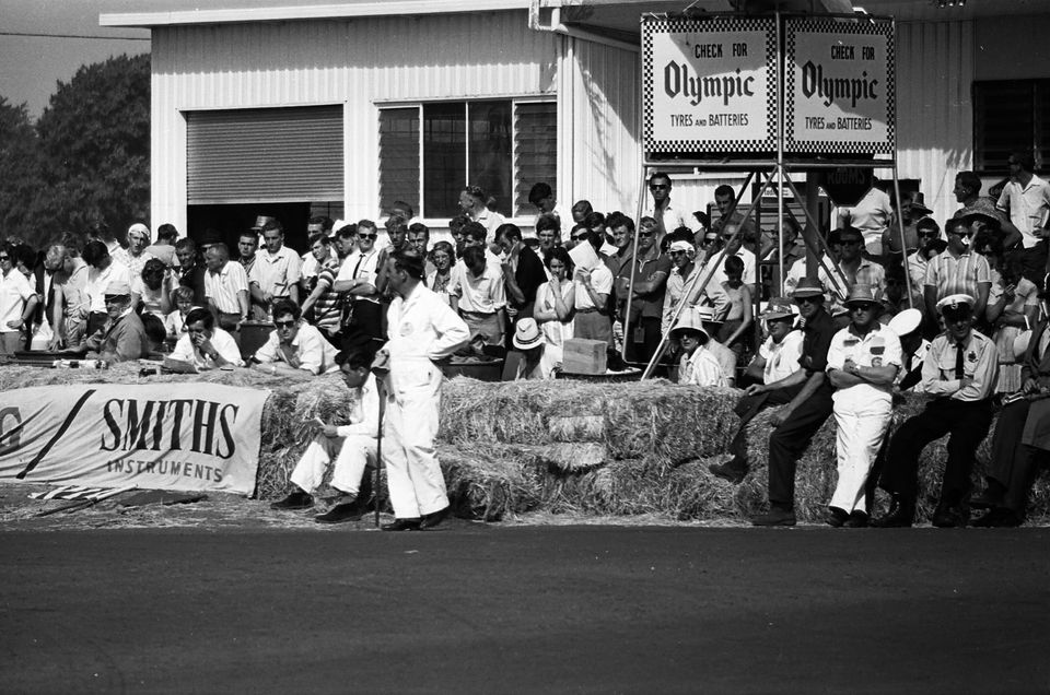 crowd on pub corner 1960 or 1964