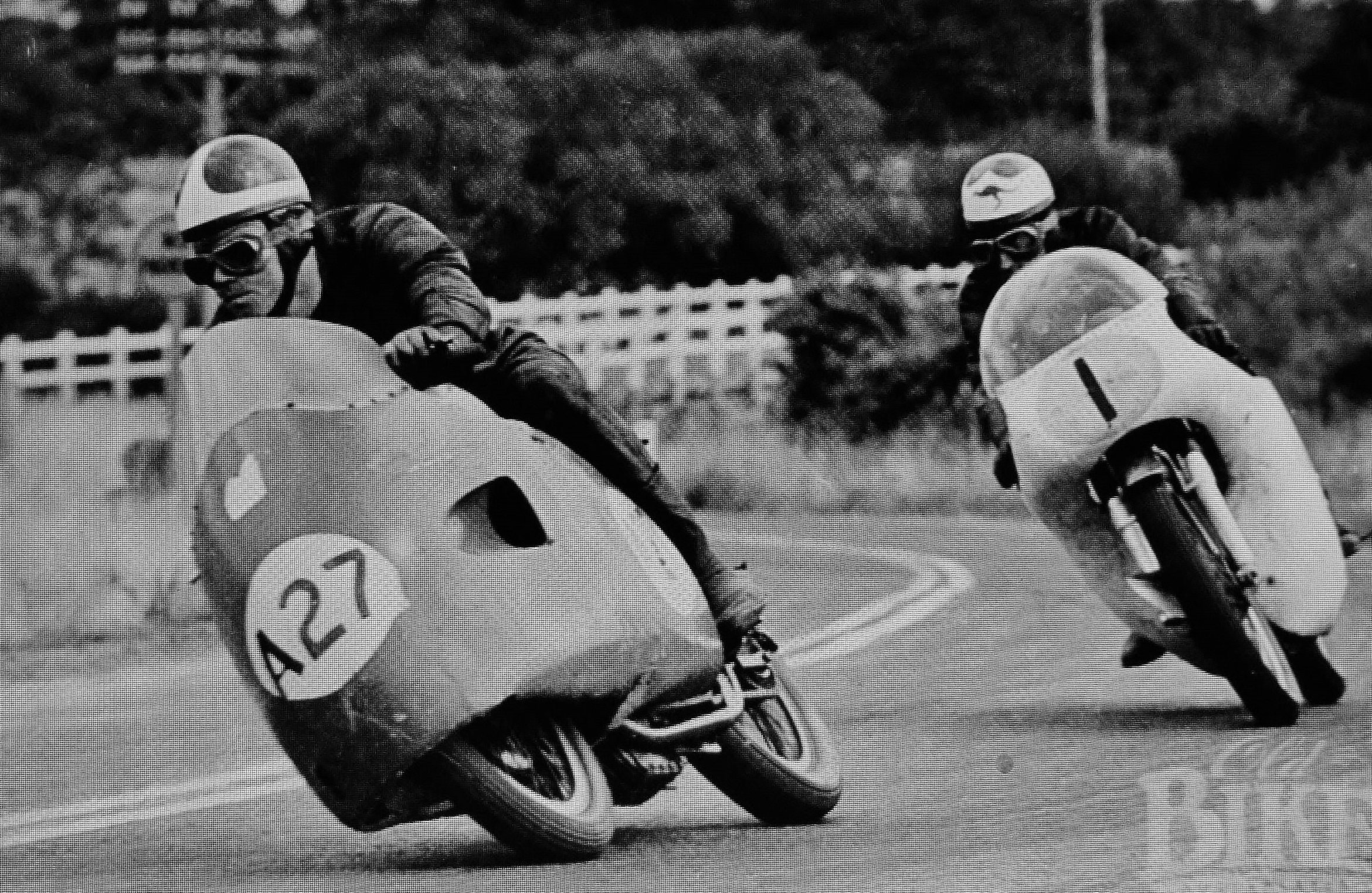 Bikes into Newry. Eric Hinton leads Tom Phillis, both riding Nortons, 1960