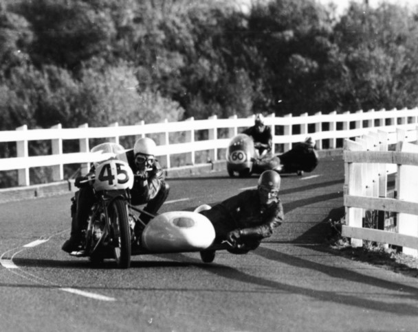 Alec Corner (rider) , Gerry O'Brien (passenger) on the Vincent lead Ray Kelly (rider) (passenger unknown) on a Norton.